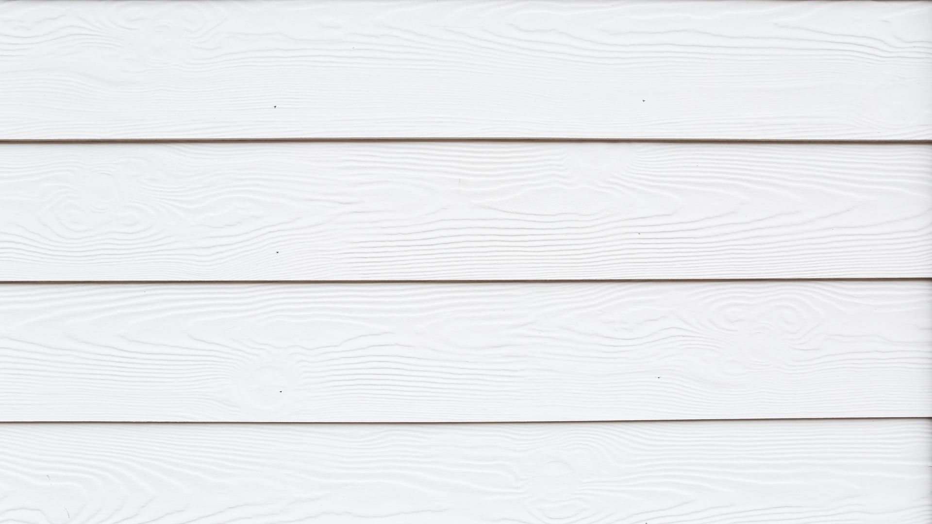 White wooden horizontal siding with wood grain texture