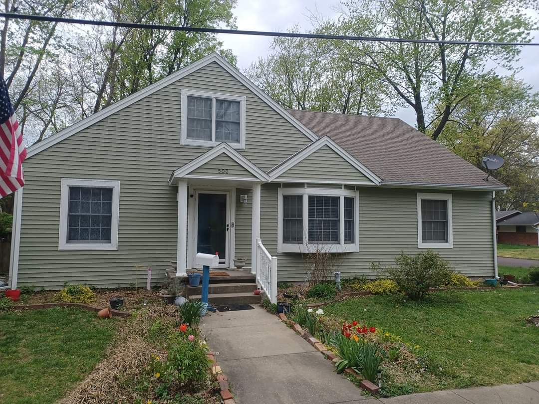 Home siding replacement by residential construction team in Sedalia, MO